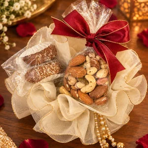 Organza potli with chocolate dates and a bag of mixed dry fruit