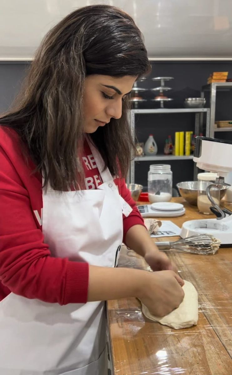 Learning to make dough in a food development class